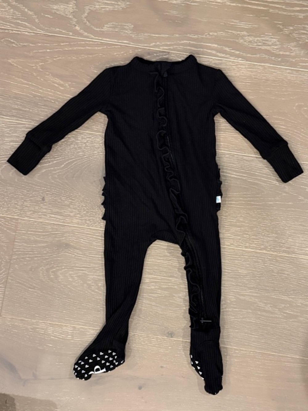 Posh Peanut - LIKE NEW - Black Ruffle Footie Pajamas - Picture 2 of 4